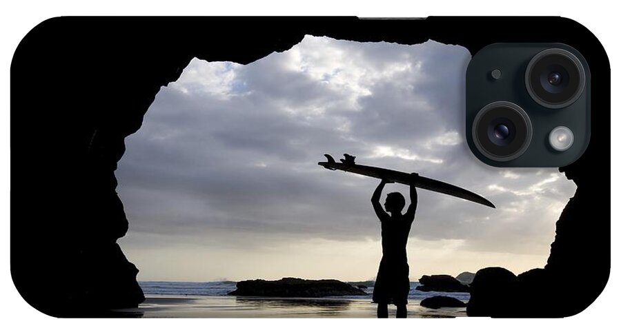 Horizon iPhone Case featuring the photograph Surfer Inside A Cave At Muriwai North by Deddeda