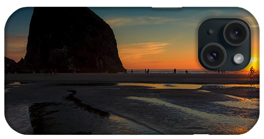 Cannon Beach iPhone Case featuring the photograph The Lone Biker by Carrie Cole
