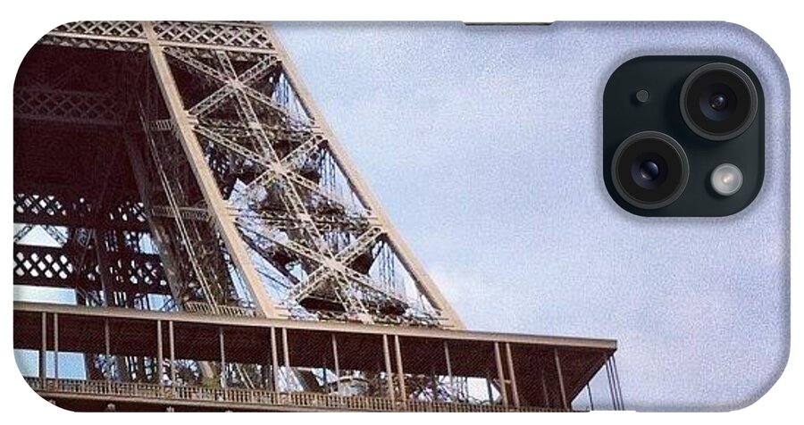 #eiffeltower #steel #france #paris #famous #icon #landmark #tower #architecture #europe #travel #sky #blue #clouds iPhone Case featuring the photograph The tower. by Brad James