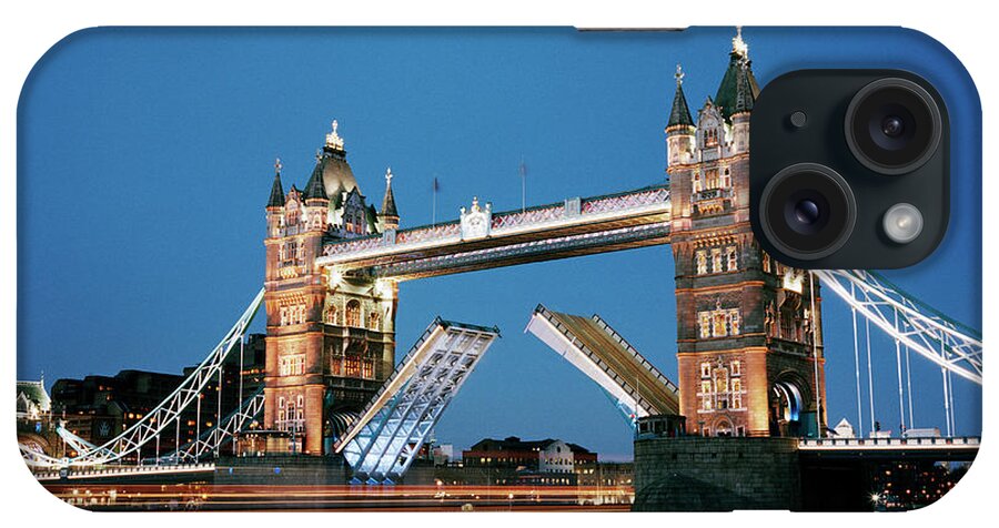 Drawbridge iPhone Case featuring the photograph Tower Bridge At Dusk by Gary Yeowell