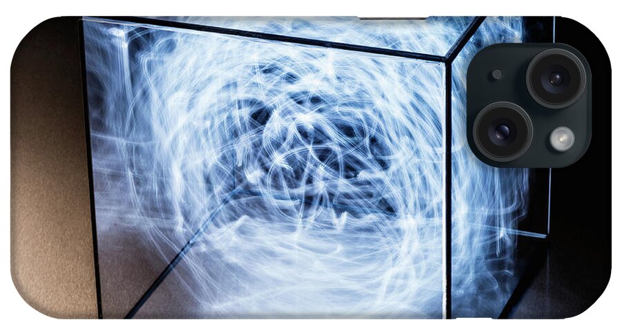 Confusion iPhone Case featuring the photograph Trails Of Blue Light In Clear Box by Pm Images