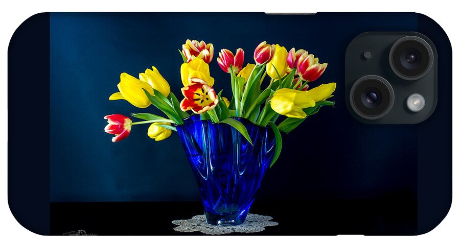 Tulips In Blue iPhone Case featuring the photograph Tulips in Blue by Torbjorn Swenelius