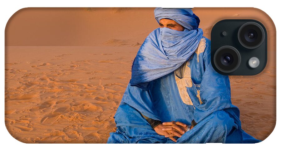 Photography iPhone Case featuring the photograph Veiled Tuareg Man Sitting Cross-legged by Panoramic Images