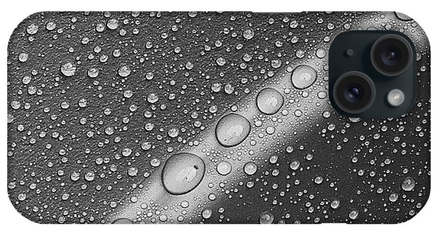 Photo iPhone Case featuring the photograph Water Droplets On An Empty Plastic by Forbes Stephenson