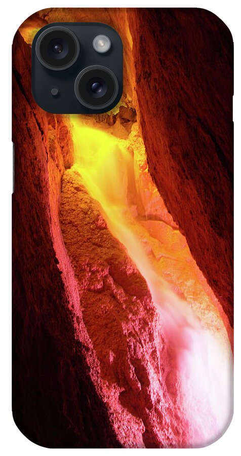Scenics iPhone Case featuring the photograph Waterfall In Cave Lit By Coloured by Rosemary Calvert