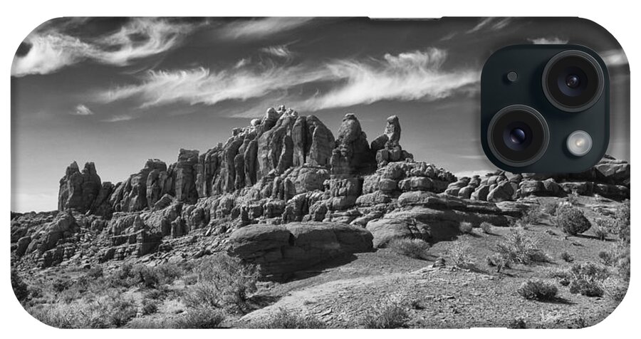 Arches National Park iPhone Case featuring the photograph Wispy Clouds Klondike Bluffs by Allan Van Gasbeck