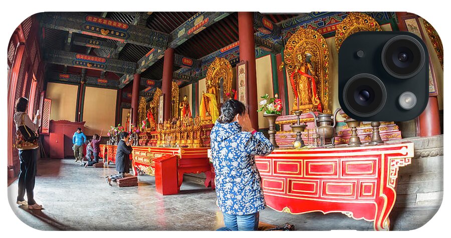 Chinese Culture iPhone Case featuring the photograph Woman In Front Of Altar, Lama Temple by Peter Adams