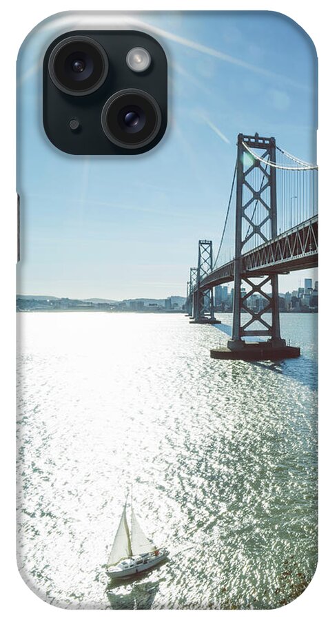 Scenics iPhone Case featuring the photograph Yacht Through Bay Bridge by Chinaface