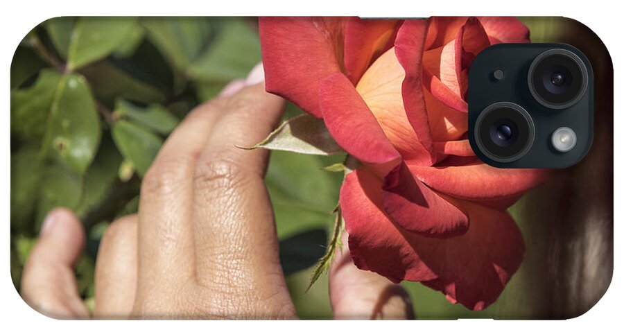Aroma iPhone Case featuring the photograph Young Woman Smelling A Rose by James L Davidson