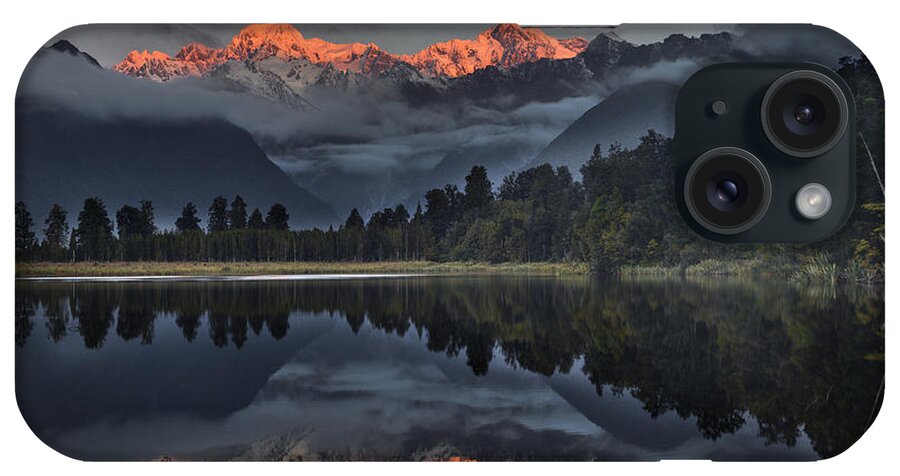 00462452 iPhone Case featuring the photograph Sunset Reflection Of Lake Matheson #1 by Colin Monteath