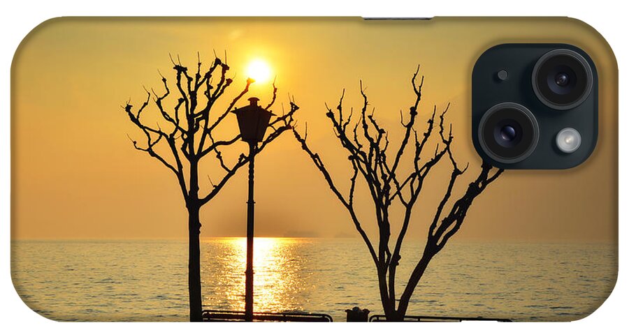 Tree iPhone Case featuring the photograph Sunlight over a lake #3 by Mats Silvan