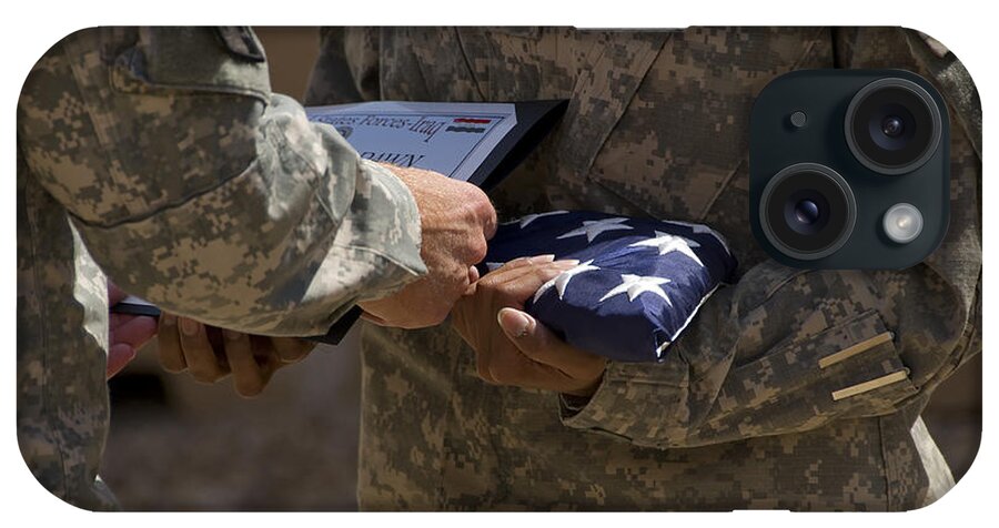 Airmen iPhone Case featuring the photograph A Soldier Is Presented The American by Stocktrek Images