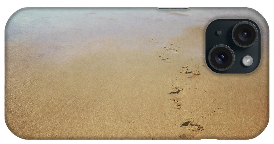 Footprints iPhone Case featuring the photograph Footprints in the sand by Lyn Randle