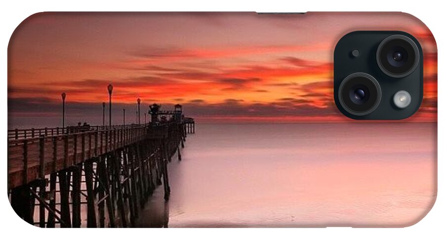 All_sunsets iPhone Case featuring the photograph Long Exposure Sunset At The Oceanside by Larry Marshall