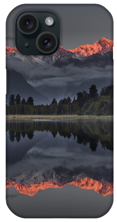 00462453 iPhone Case featuring the photograph Sunset Reflection Of Lake Matheson by Colin Monteath