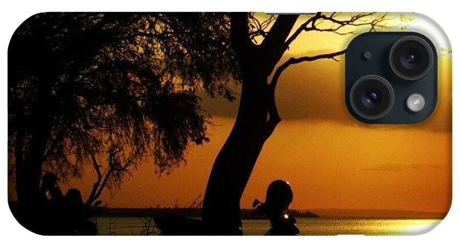 Sunrise_sunset_aroundworld iPhone Case featuring the photograph #sunset #sunsethunter #sunset_lovee by Gede Eka Darmaya