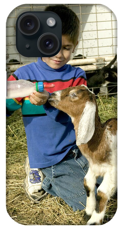 Goat iPhone Case featuring the photograph Boy Bottle Feeding Kid #1 by Inga Spence