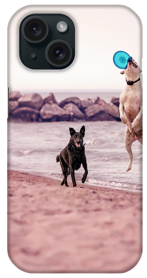 Action iPhone Case featuring the photograph Dog with frisbee #1 by Peter Lakomy