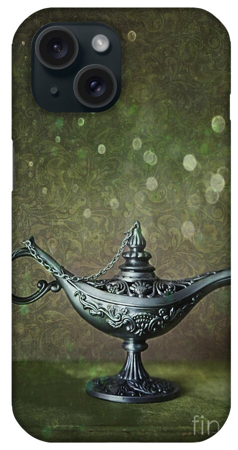  Magic iPhone Case featuring the photograph Genie lamp on old book #1 by Sandra Cunningham