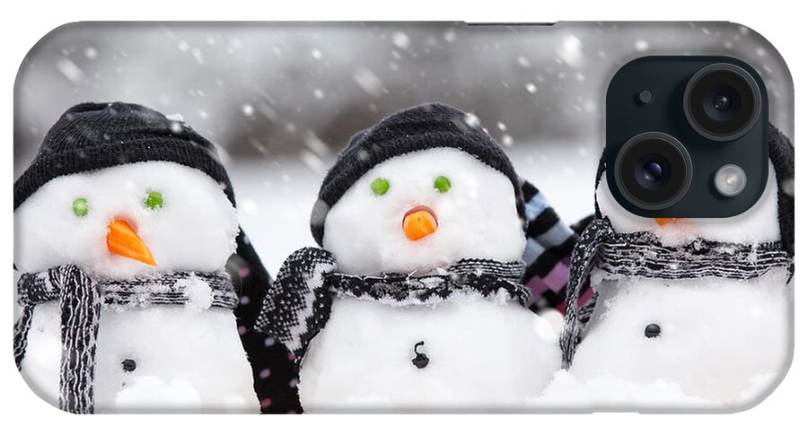 Christmas iPhone Case featuring the photograph Three cute snowmen #1 by Simon Bratt