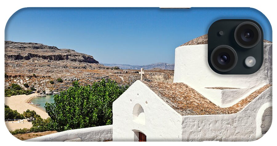 Chapel iPhone Case featuring the photograph A chapel in the village of Lindos in Rhodes - Greece. by Constantinos Iliopoulos