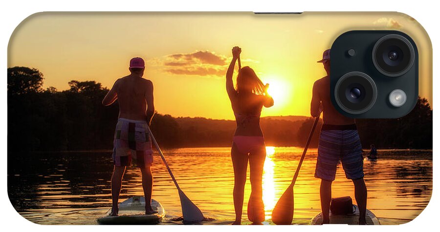 Stand Up Paddle Boarding (sup) iPhone Case featuring the photograph A group of friends, silhouetted by the sunset, exercise on stand-up paddle boards on Lady Bird Lake in Austin, Texas by Dan Herron