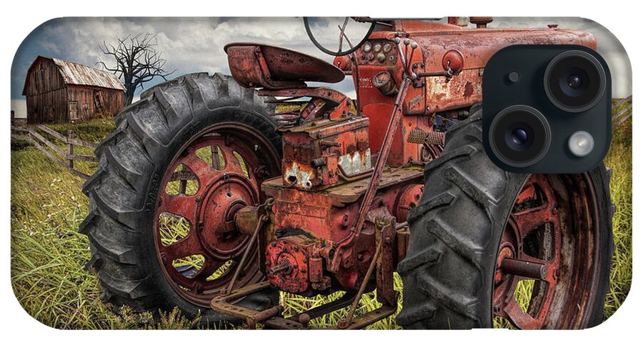 Art iPhone Case featuring the photograph Abandoned Old Farmall Tractor in a Grassy Field by Randall Nyhof