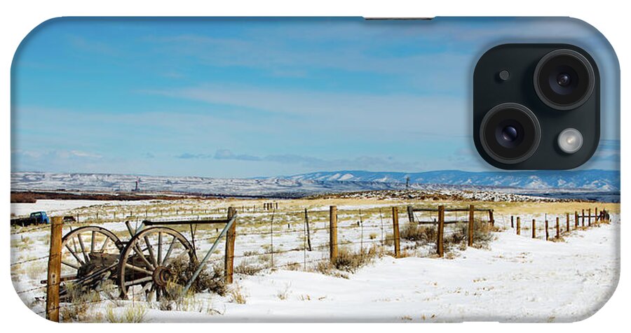 Fence iPhone Case featuring the photograph Antique Wheels by Sean Allen