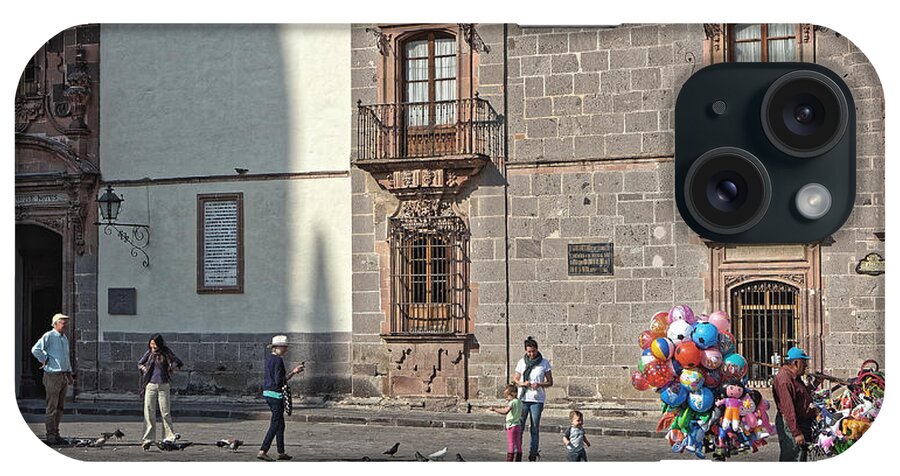 Balloon iPhone Case featuring the photograph Balloon seller, San Miguel 2014 by Chris Honeyman