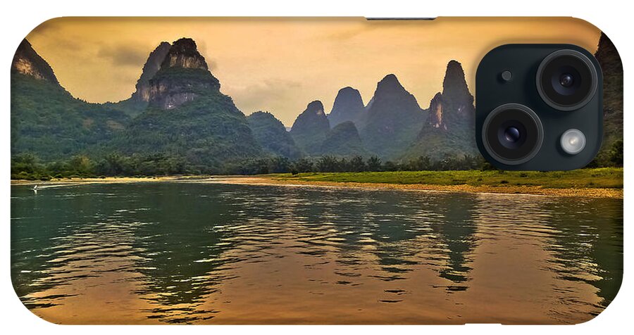 Sunset iPhone Case featuring the photograph Bathing in the golden landscape-China Guilin scenery Lijiang River in Yangshuo by Artto Pan