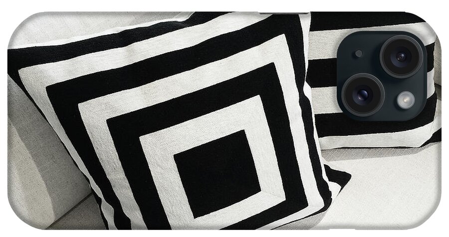 Sofa iPhone Case featuring the photograph Black and white cushions on a sofa by GoodMood Art