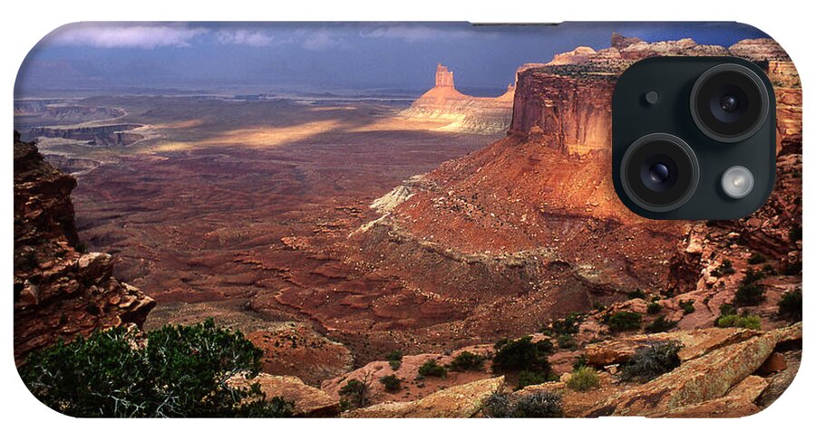 Canyonlands National Park iPhone Case featuring the photograph Candlestick Tower in Nature's Spotlight by Dan Norris