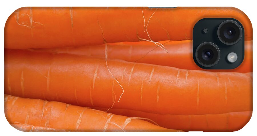 Carrots iPhone Case featuring the photograph Carrots by Wim Lanclus
