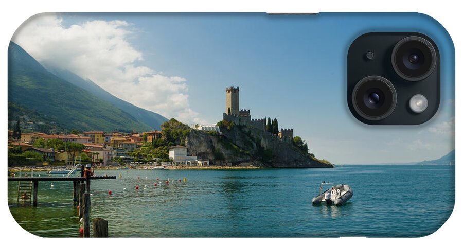 Lake iPhone Case featuring the photograph Castle of Malcesine, view from the beach by Nicola Aristolao