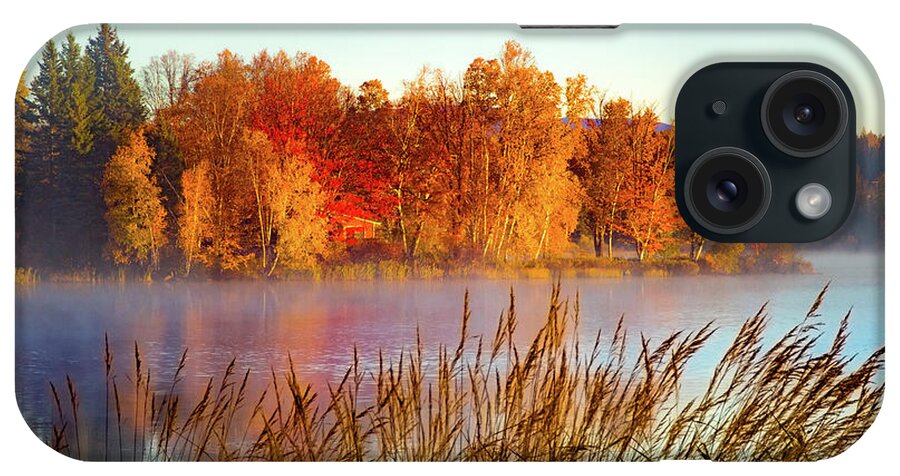 #jefffolger iPhone Case featuring the photograph Colorful dawn on Haley Pond by Jeff Folger