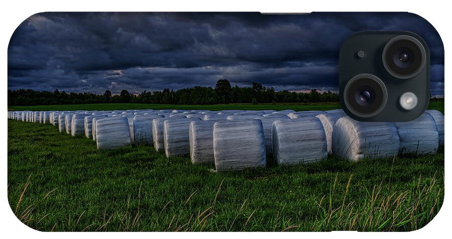 Farmer iPhone Case featuring the photograph Covered Hay Bales by Dale Kauzlaric