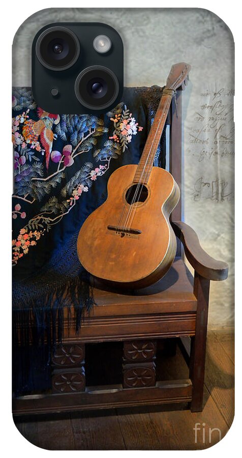 Photography iPhone Case featuring the photograph Guitar on a Bench by Scott Parker
