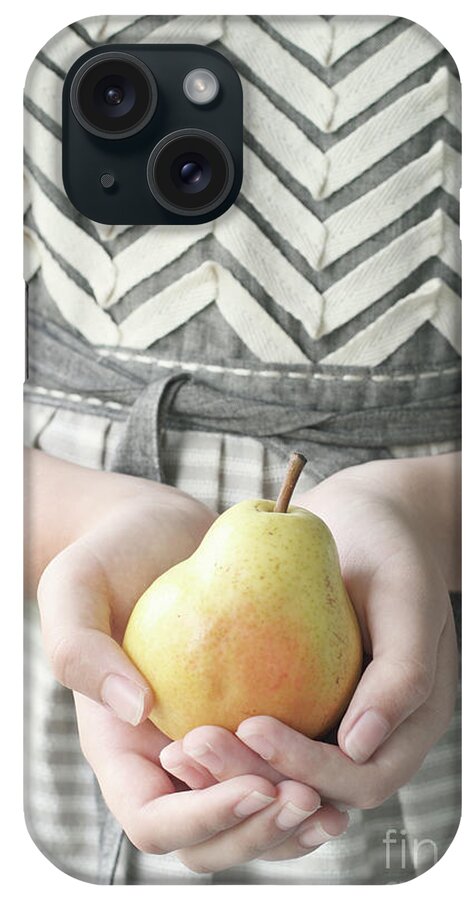 Girl iPhone Case featuring the photograph Hands holding yellow pear by Stephanie Frey
