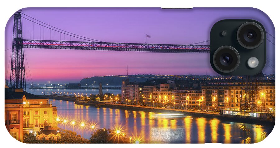 Hanging iPhone Case featuring the photograph Hanging bridge of Vizcaya at night by Mikel Martinez de Osaba