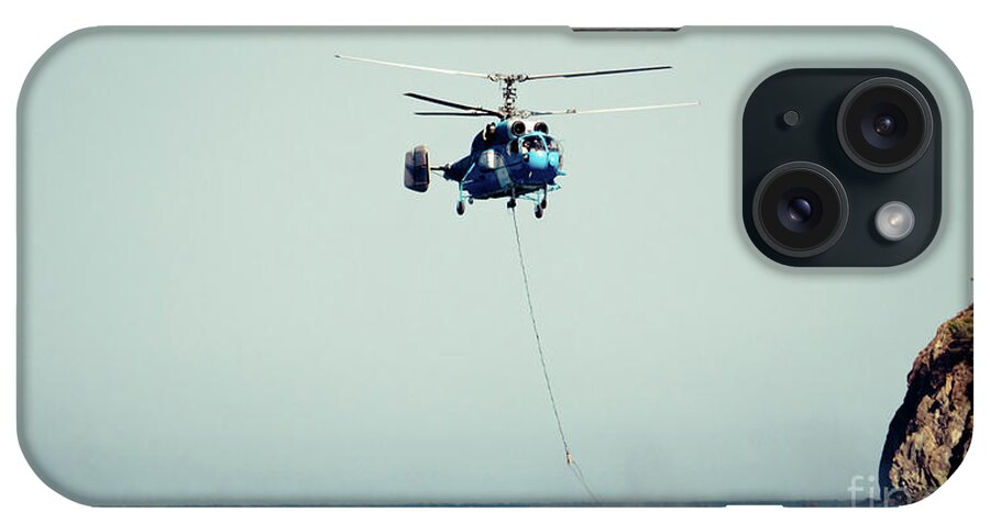 Aerospace iPhone Case featuring the photograph Helicopter firefighter take water in the sea by Raimond Klavins