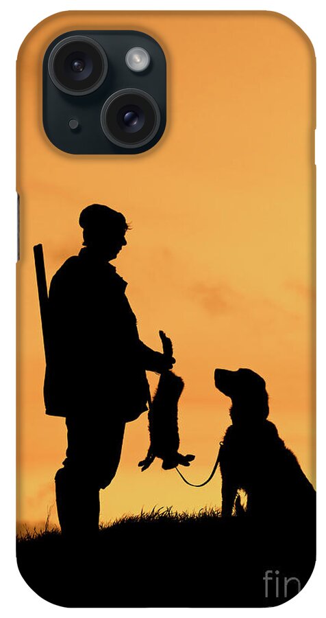 Hunter iPhone Case featuring the photograph Hunter with Dog at Sunset by Arterra Picture Library