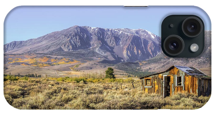 Old Barn iPhone Case featuring the photograph Lone on the range by Charles Garcia
