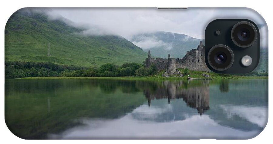 Kilchurn Castle iPhone Case featuring the photograph Mist swarms around Kilchurn Castle by Stephen Taylor