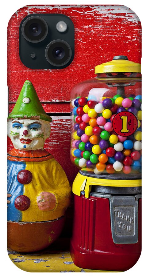 Old Clown Toy iPhone Case featuring the photograph Old clown toy and gum machine by Garry Gay
