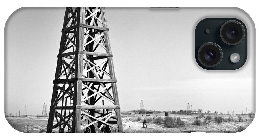 Oilfield iPhone Case featuring the photograph Old Wooden Derrick by Larry Keahey