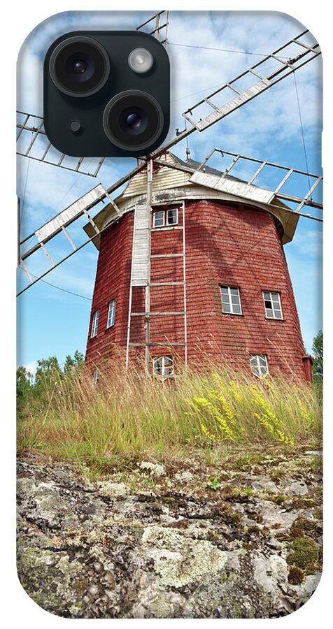 Windmill iPhone Case featuring the photograph Old wooden windmill in Sweden by GoodMood Art