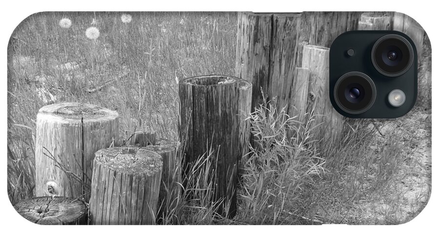 Black And White Photo Of Cut Down Fence Posts iPhone Case featuring the photograph Posts in a row by Erick Schmidt