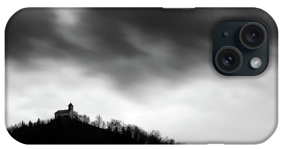 Saint iPhone Case featuring the photograph Rainclouds over church by Ian Middleton
