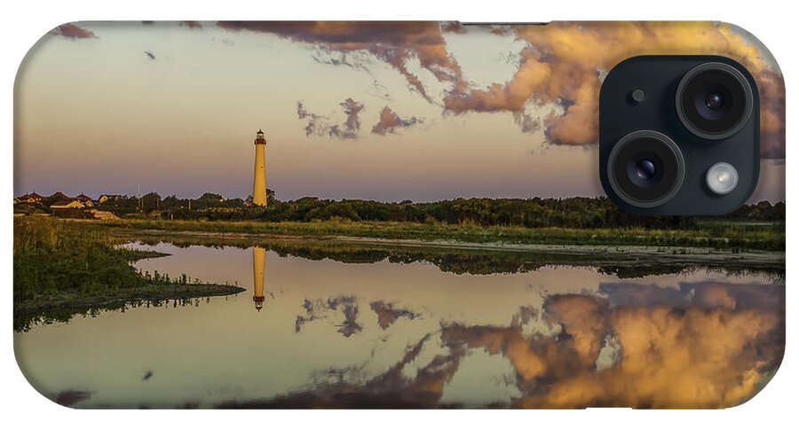 Architecture iPhone Case featuring the photograph Reflection of Clouds and Lighthouse by Nick Zelinsky Jr