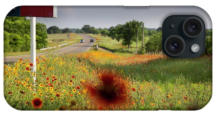 Postal Box iPhone Case featuring the photograph Rustic Texas flag mailbox surrounded by colorful wildflowers, Te by Dan Herron